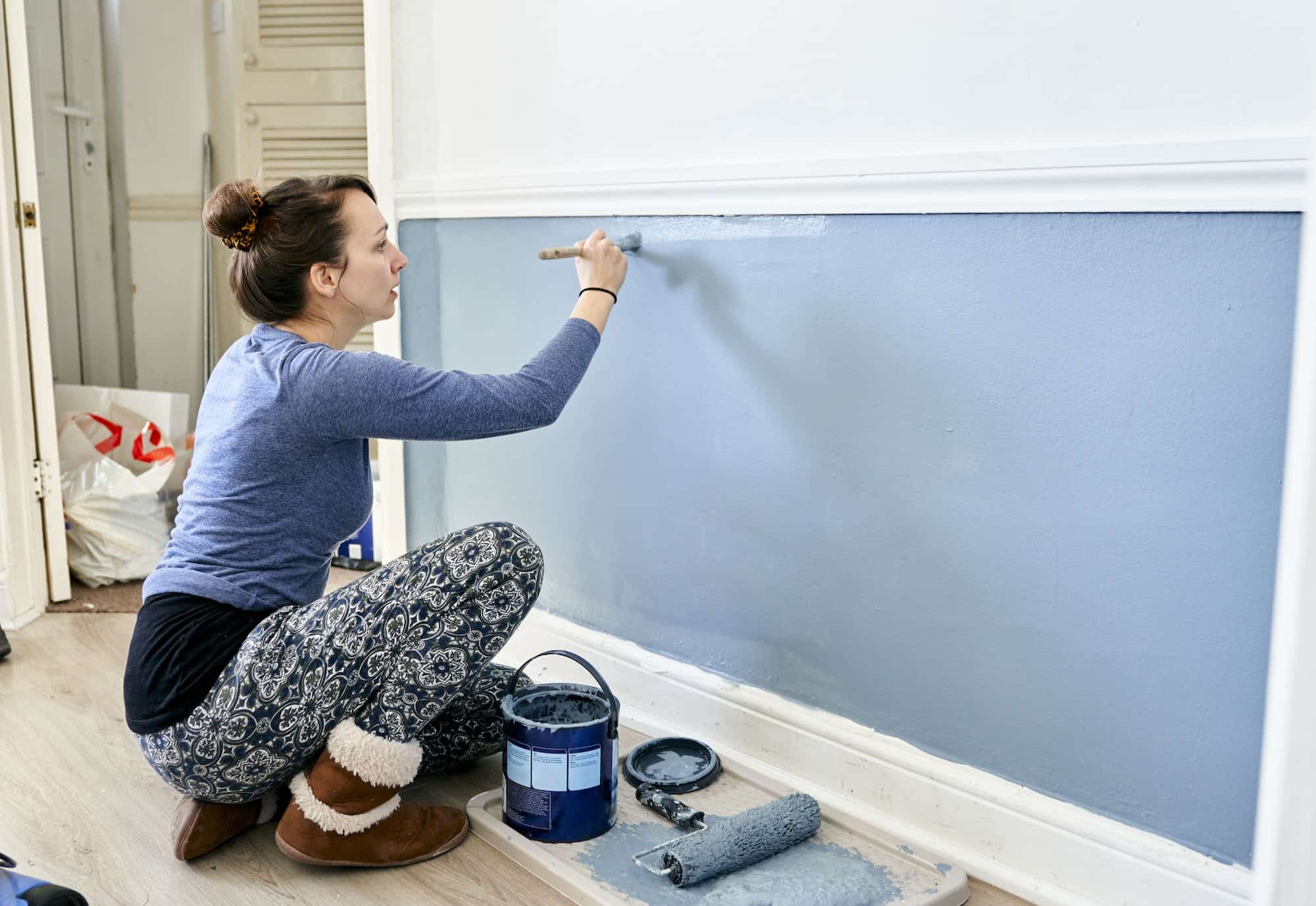 woman-painting-wall-at-home-.jpg